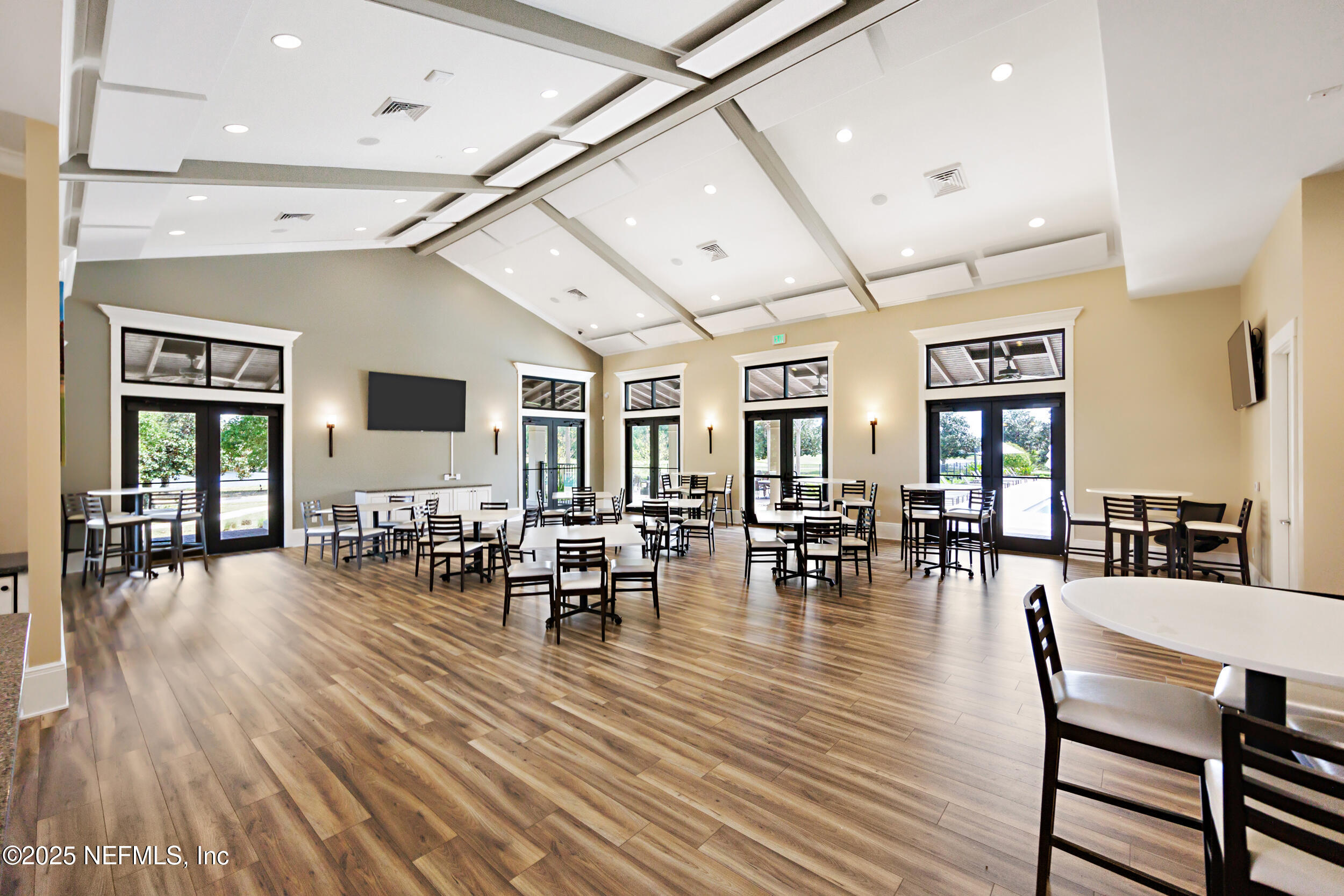 1185 Garrison Drive St. Augustine, FL 32092 - Photo 60 of 70 a view of a dining room with furniture and wooden floor