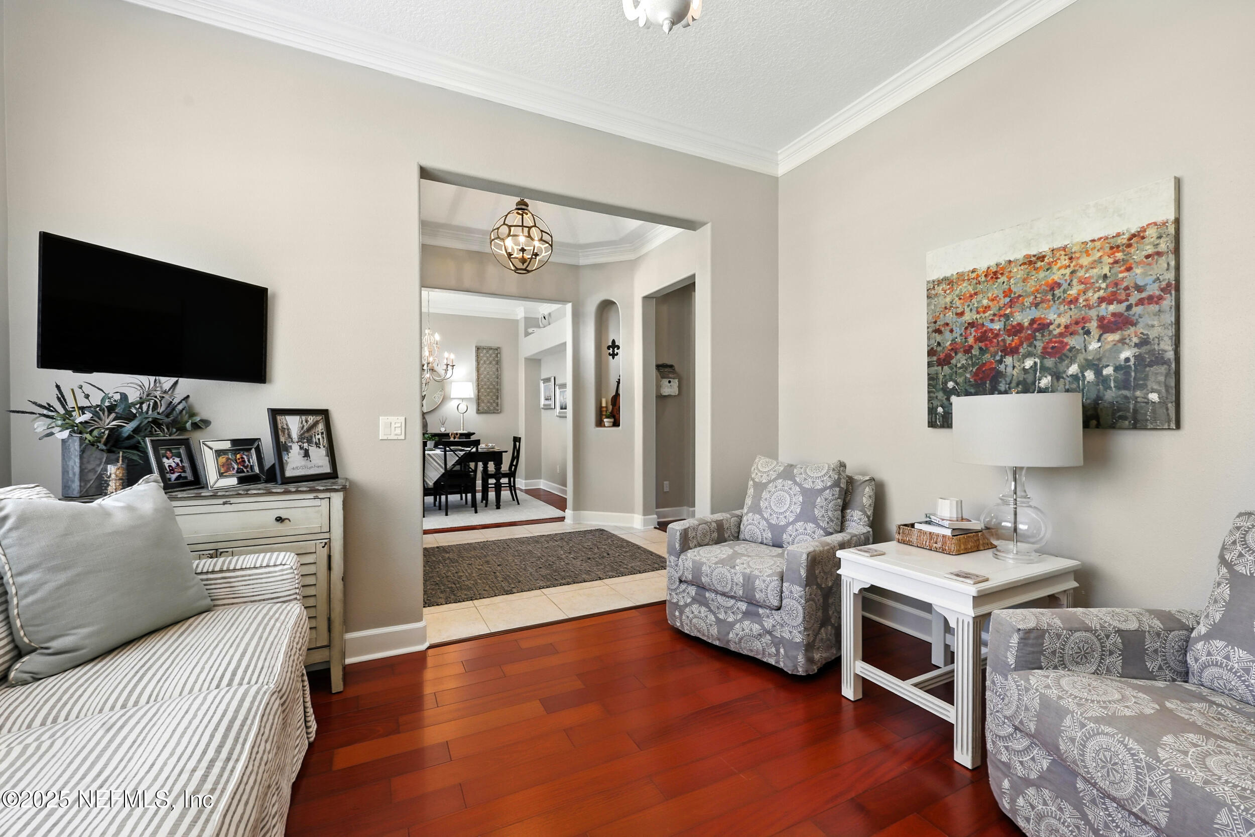 1185 Garrison Drive St. Augustine, FL 32092 - Photo 7 of 70 a living room with furniture and a flat screen tv