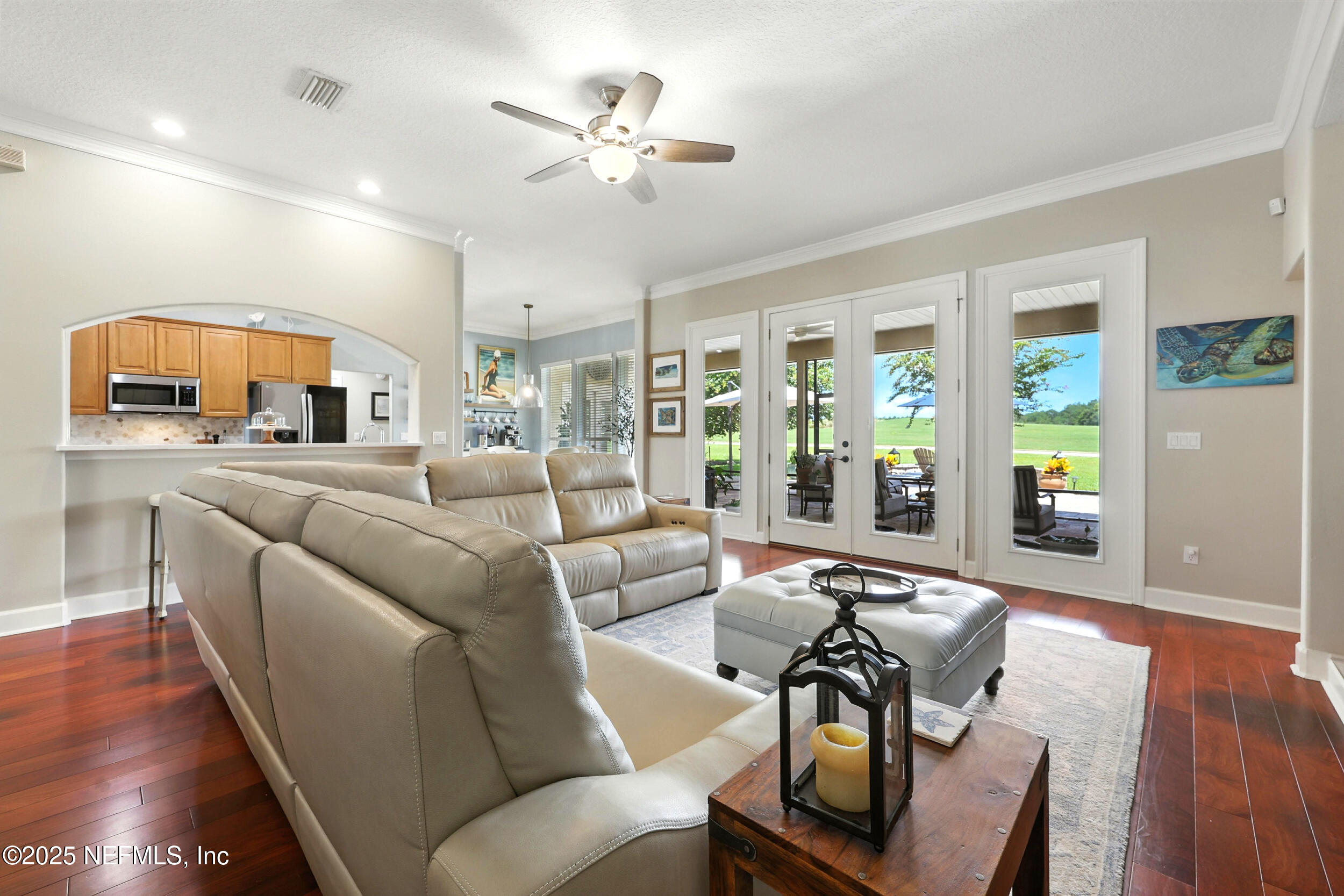 1185 Garrison Drive St. Augustine, FL 32092 - Photo 10 of 70 a living room with furniture and wooden floor