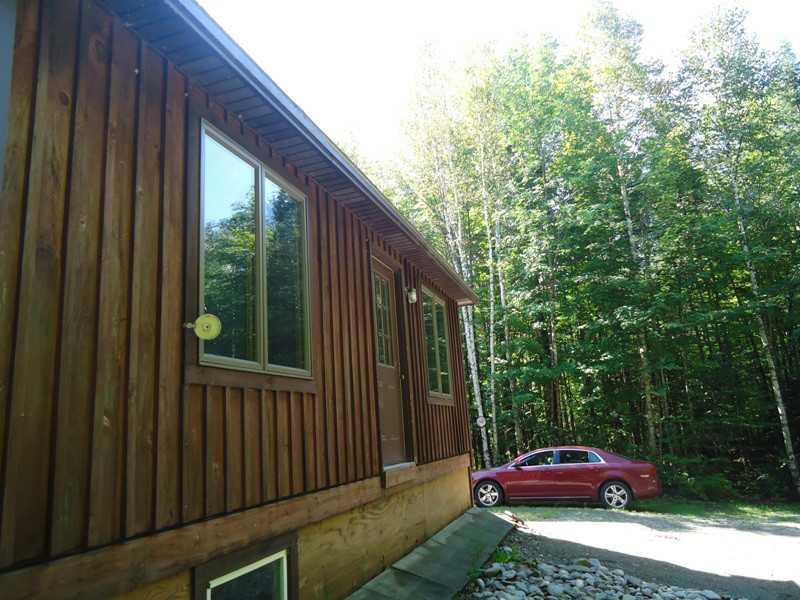 139 Dead Water Road Moscow, ME 04920 - Photo 4 of 23 Exterior Side View.