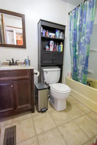 a view of a kitchen with furniture and window