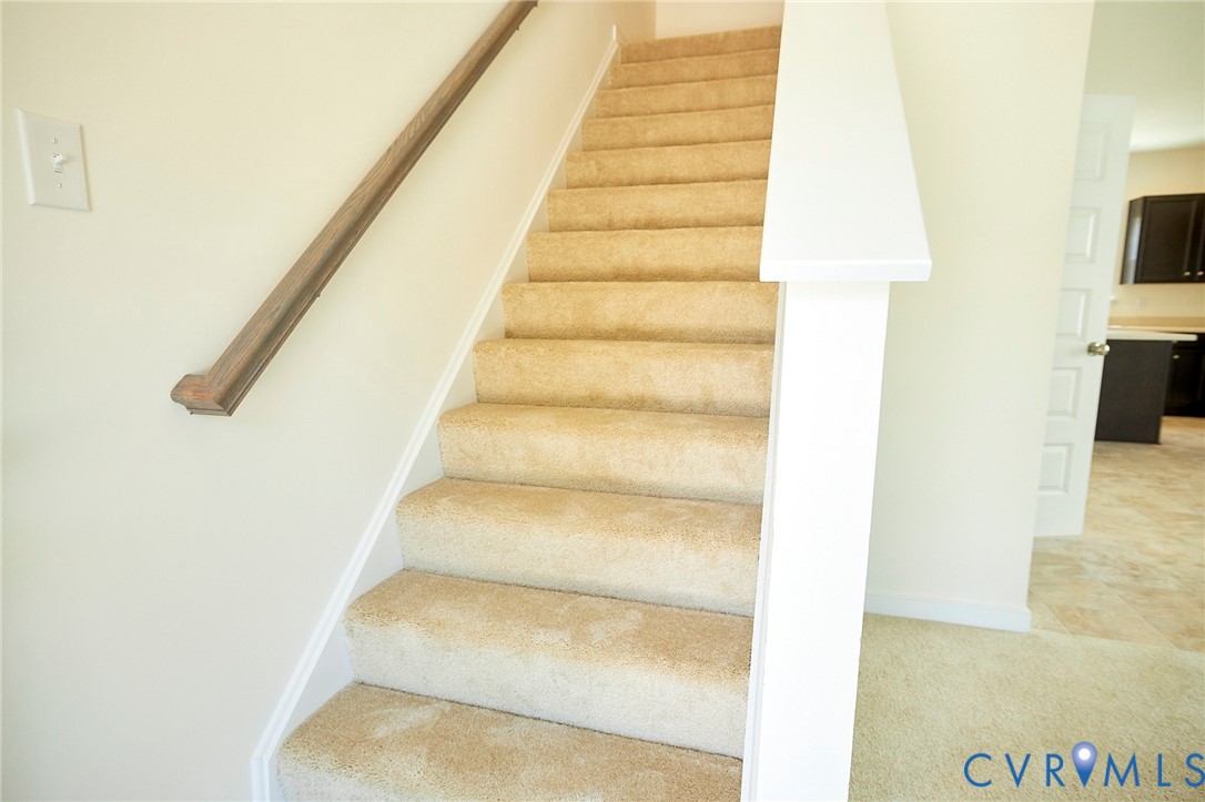 214 Greenpark Road Sandston, VA 23150 - Photo 17 of 50 Stairway with baseboards and carpet floors