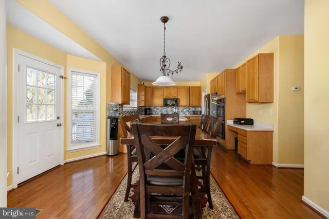 a kitchen with granite countertop cabinets and a sink
