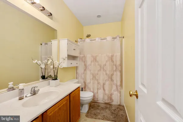 a bedroom with furniture and a bed