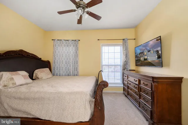 a bathroom with a bathtub and a window