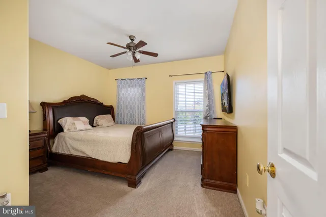 a spacious bathroom with a double vanity sink mirror and double