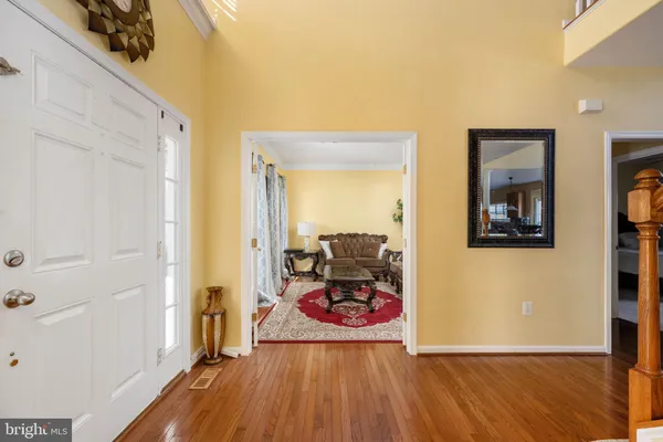 a view of entryway with wooden floor