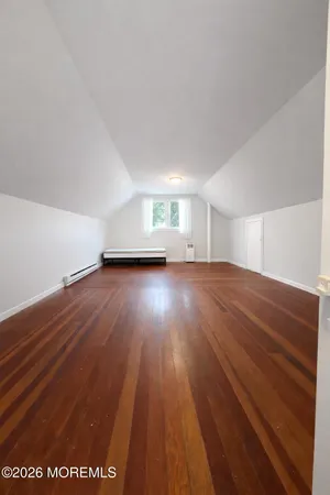 a view of livingroom with hardwood floor and window