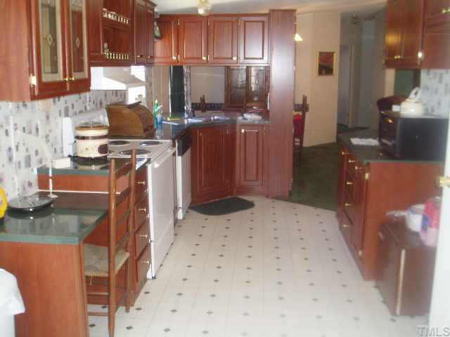9020 Kennebec Road Willow Spring, NC 27592 - Photo 6 of 10 Kithcen with like-new stove and breakfast nook Other