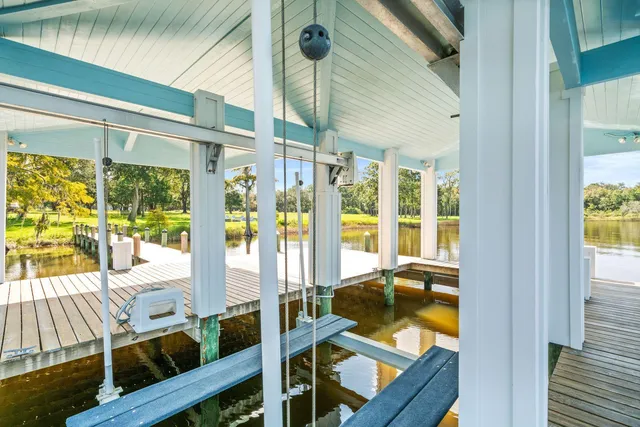 a view of yard with swimming pool and green space