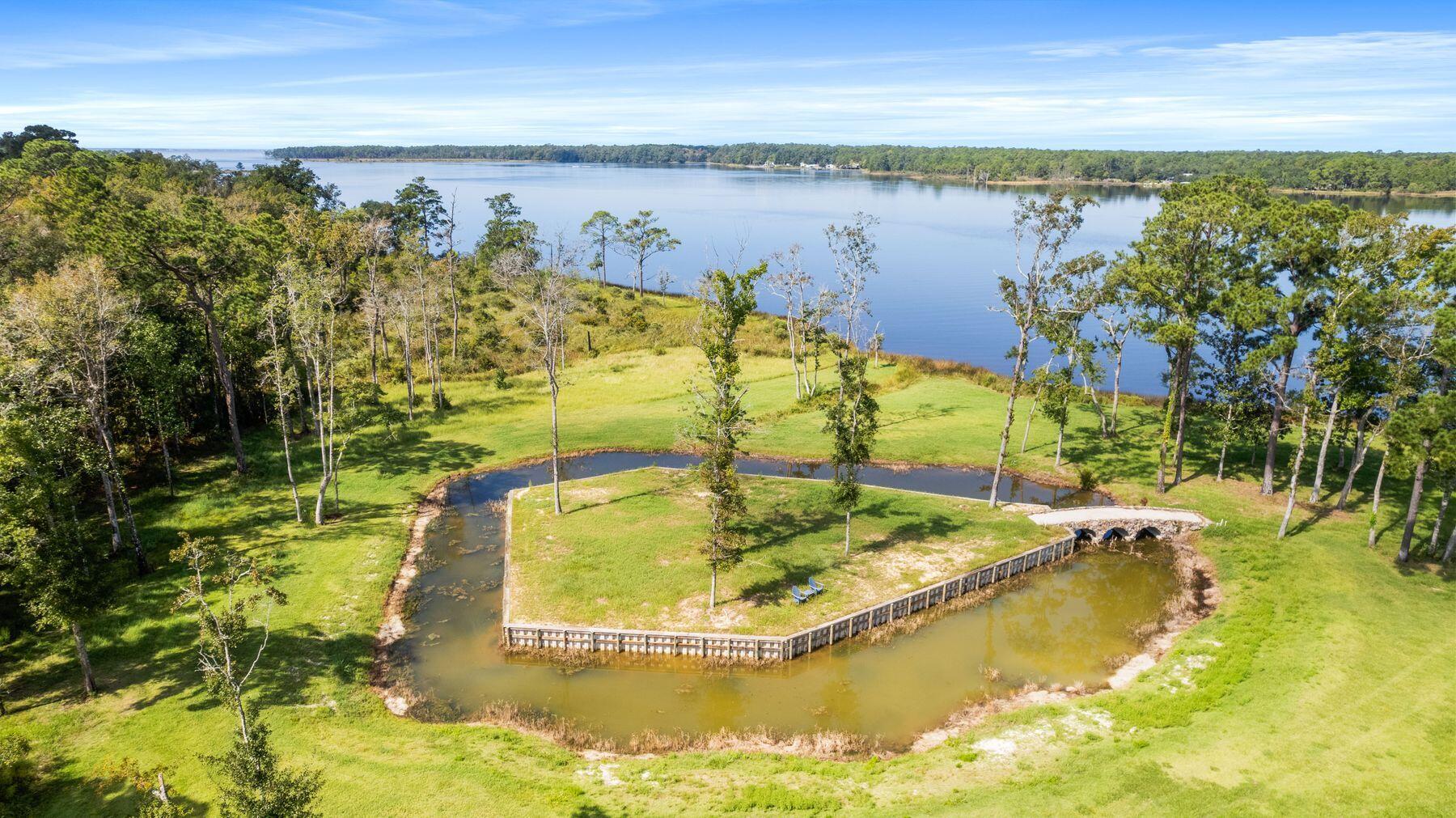 147 Dexton King Freeport, FL 32439 - Photo 15 of 23 a view of a lake