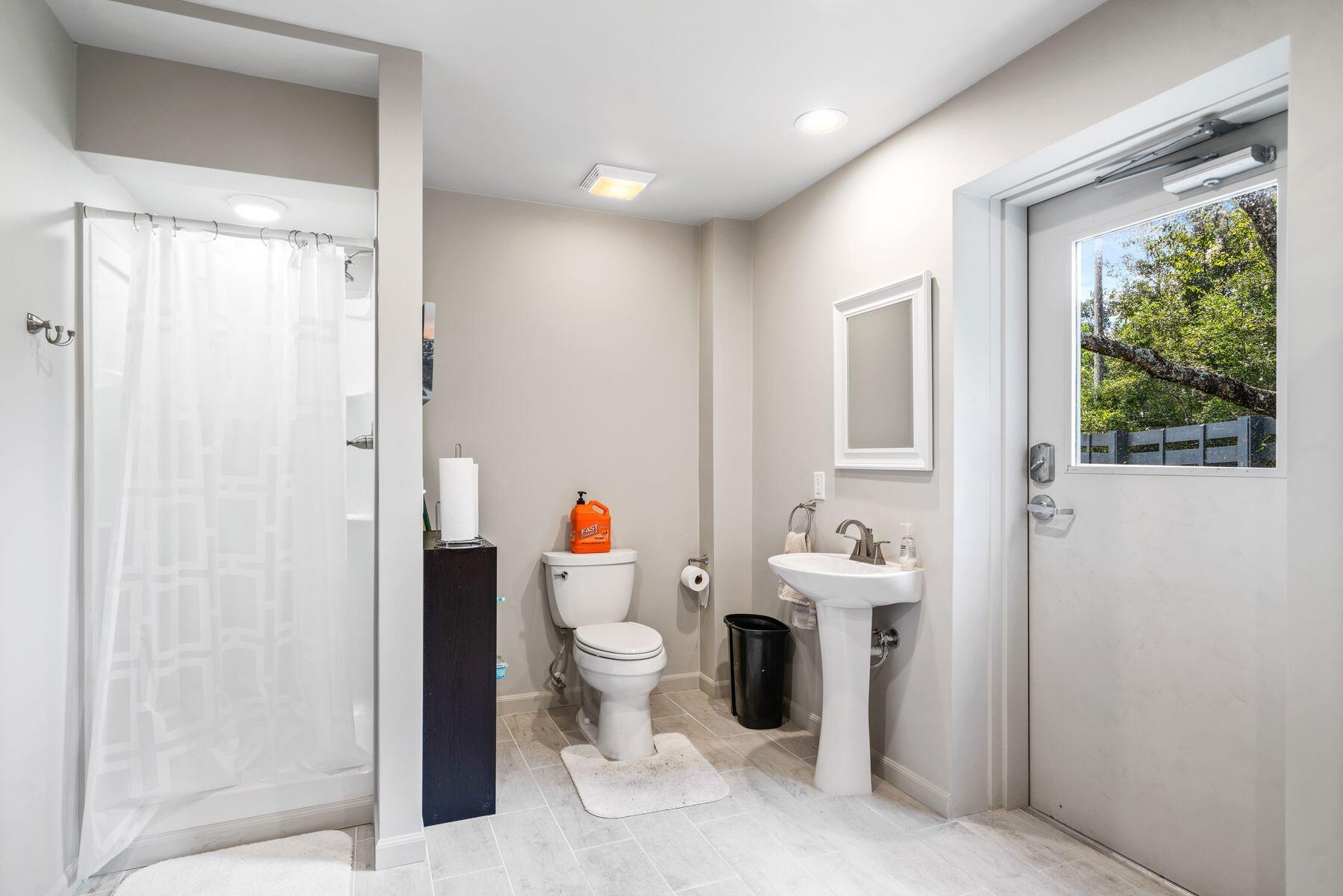 147 Dexton King Freeport, FL 32439 - Photo 20 of 23 a bathroom with a sink toilet and shower