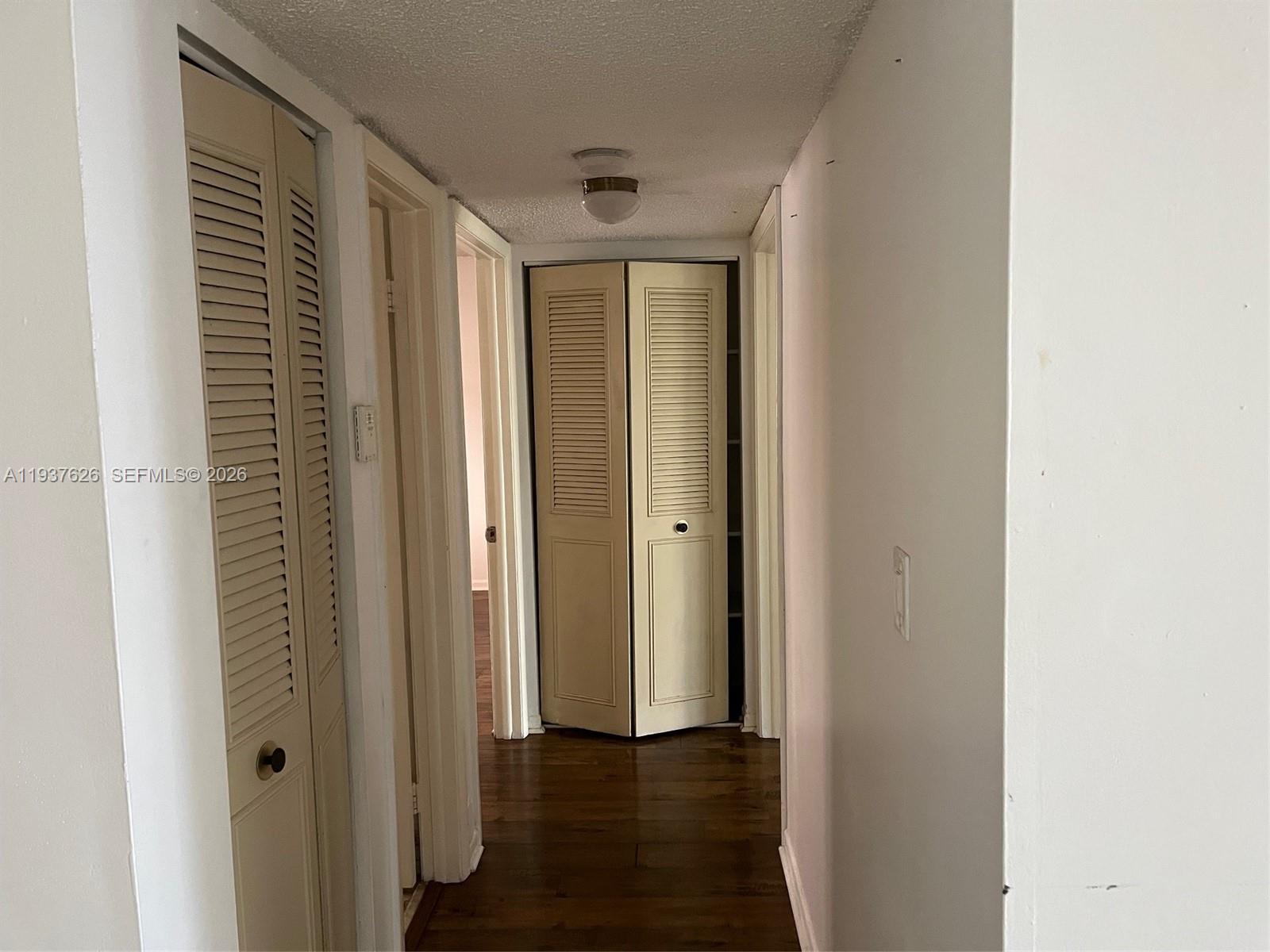 8420 Southwest 133rd Avenue Road, Unit 308 Miami, FL 33183 - Photo 8 of 16 a view of entryway with wooden floor