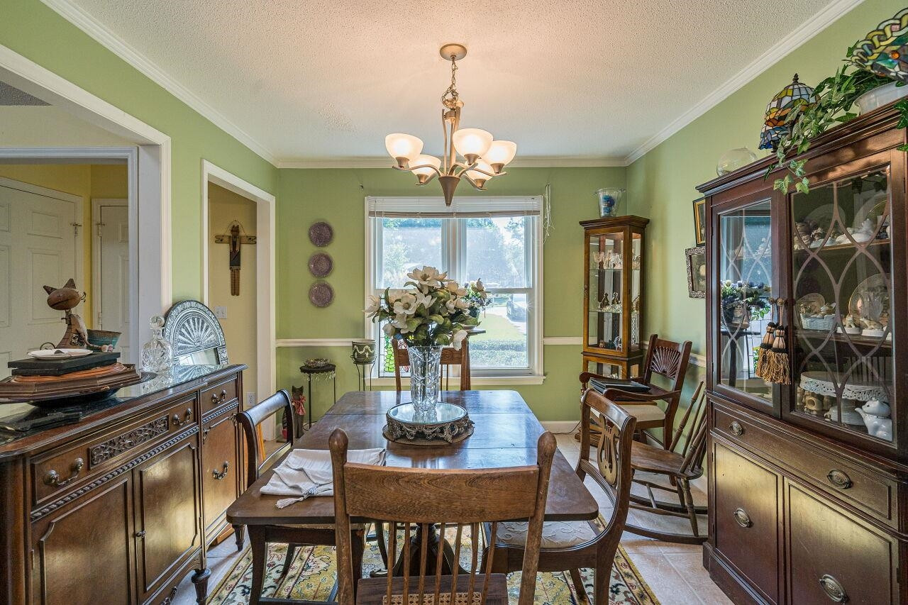 106 Riding Ridge Road Fuquay-Varina, NC 27526 - Photo 8 of 28 Imagine hosting holiday gatherings or family celebrations in this lovely space. Dining Room