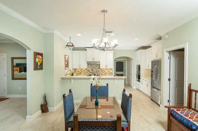 a bathroom with a shower a toilet and a sink