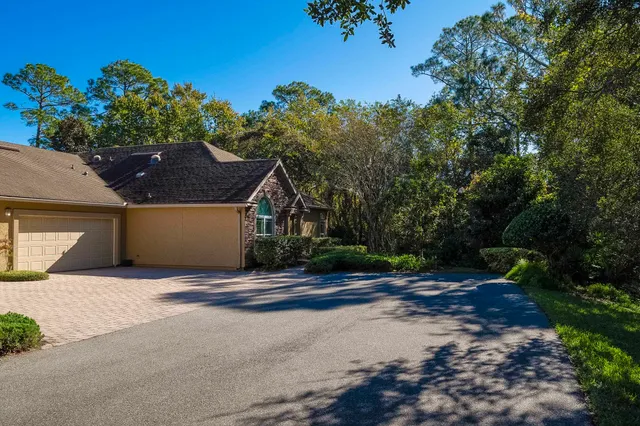 a view of a trees in front of a house