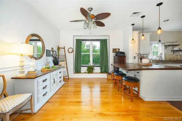 a very nice looking kitchen with a large window