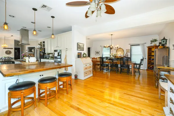 a room with lots of table and chairs