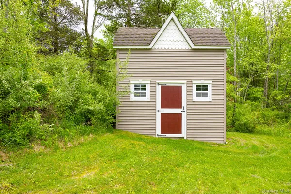 a view of an ocean and a yard