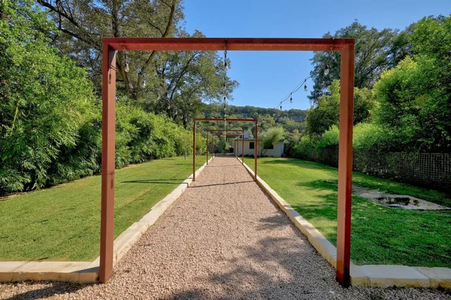 a view of a back yard with a big yard