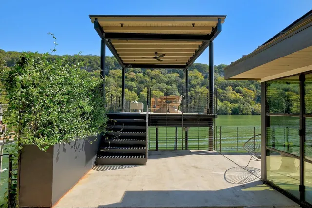 a view of a balcony with chairs