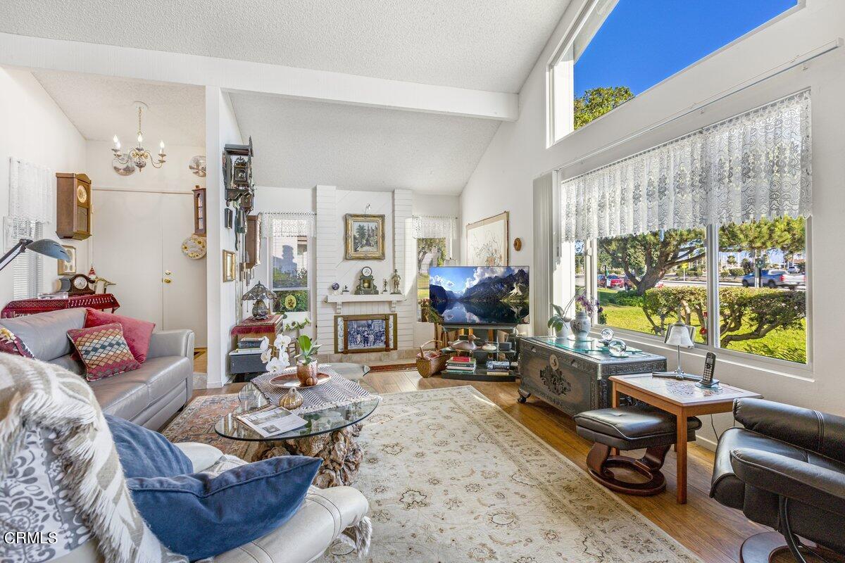 3330 Sunset Lane Oxnard, CA 93035 - Photo 5 of 29 a living room with furniture and a large window