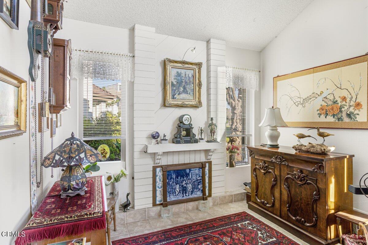3330 Sunset Lane Oxnard, CA 93035 - Photo 10 of 29 a living room with furniture and a fireplace