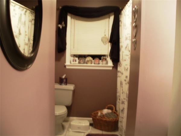 73 Musquash Road Hudson, NH 03051 - Photo 6 of 14 a bathroom with a toilet and a mirror