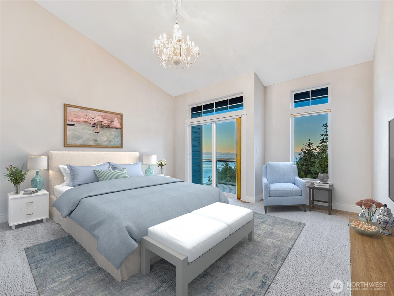 3224 Overlook Loop Ilwaco, WA 98624 - Photo 18 of 40 a bedroom with a large bed and a chandelier