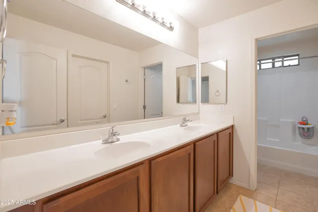a bathroom with a sink and a bathtub