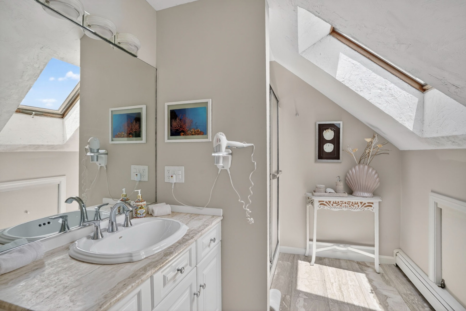 9 Thaxter Lane Edgartown, MA 02539 - Photo 31 of 53 a en suite bathroom with a sink double vanity and a mirror