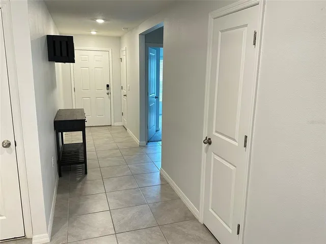 a view of a livingroom with a hallway