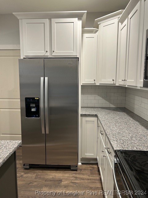 1113 Dean Road St. Pauls, NC 28384 - Photo 11 of 29 a kitchen with granite countertop a refrigerator and cabinets