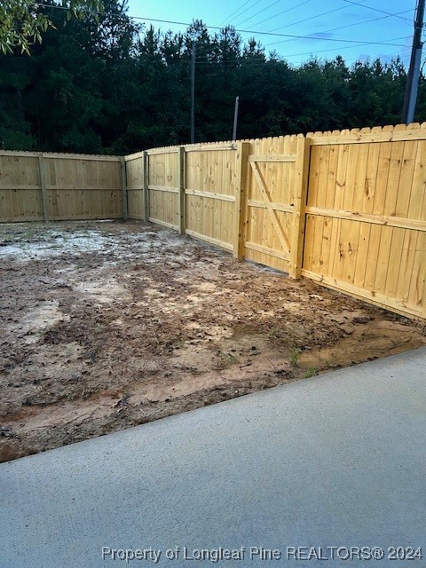 1113 Dean Road St. Pauls, NC 28384 - Photo 6 of 29 a view of a backyard