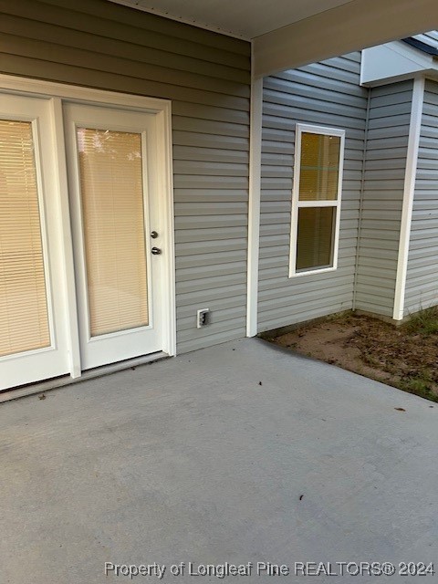 1113 Dean Road St. Pauls, NC 28384 - Photo 7 of 29 an empty room with windows