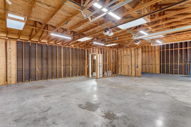 a view of a room with wooden walls