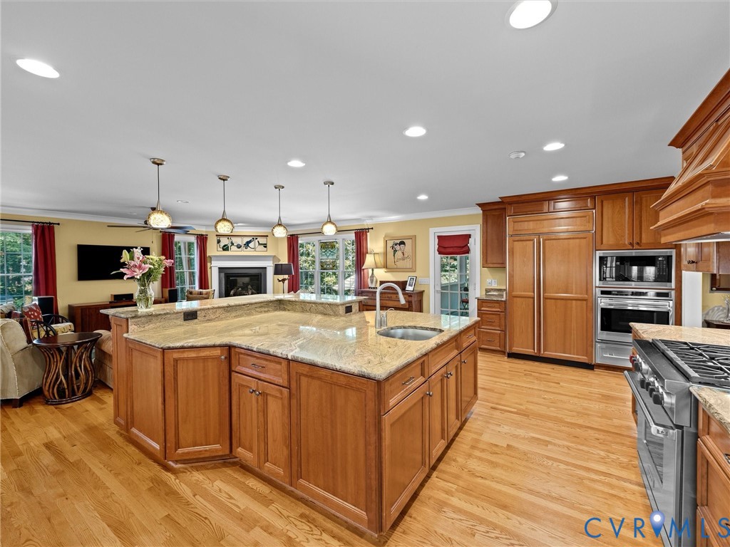 4428 Shirley Road Richmond, VA 23225 - Photo 29 of 70 Pendant and recessed lighting, plus loads of windo
