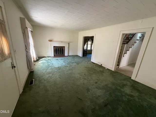 a view of empty room with front door