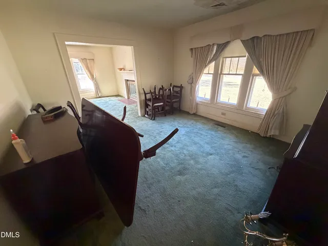 a living room with furniture and a couch