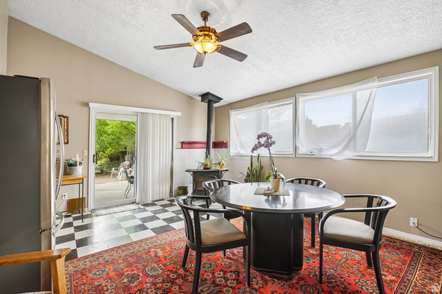392 West 200 South Tooele, UT 84074 - Photo 15 of 29 Dining, sunroom, could be another bedroom