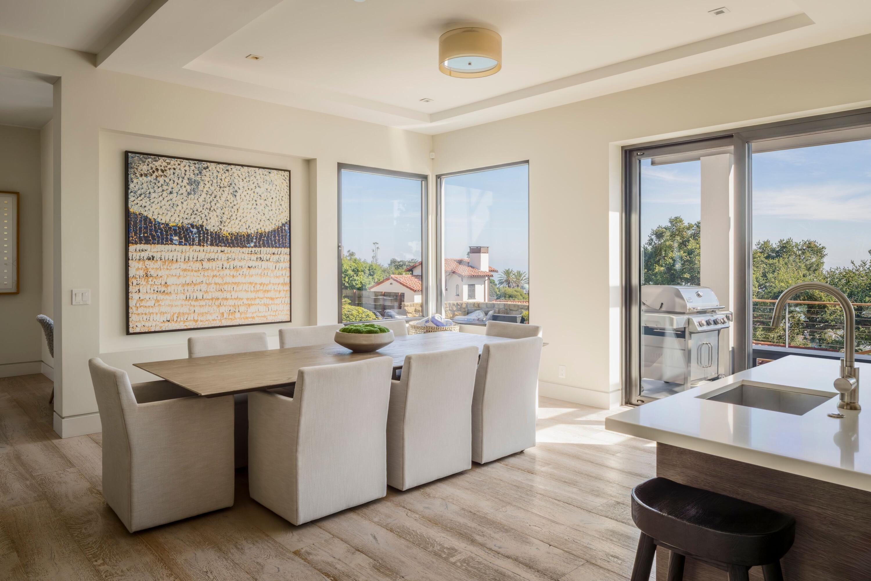 1131 Las Alturas Road, Unit A Santa Barbara, CA 93103 - Photo 10 of 47 9. Living Room with Fireplace and Slidin