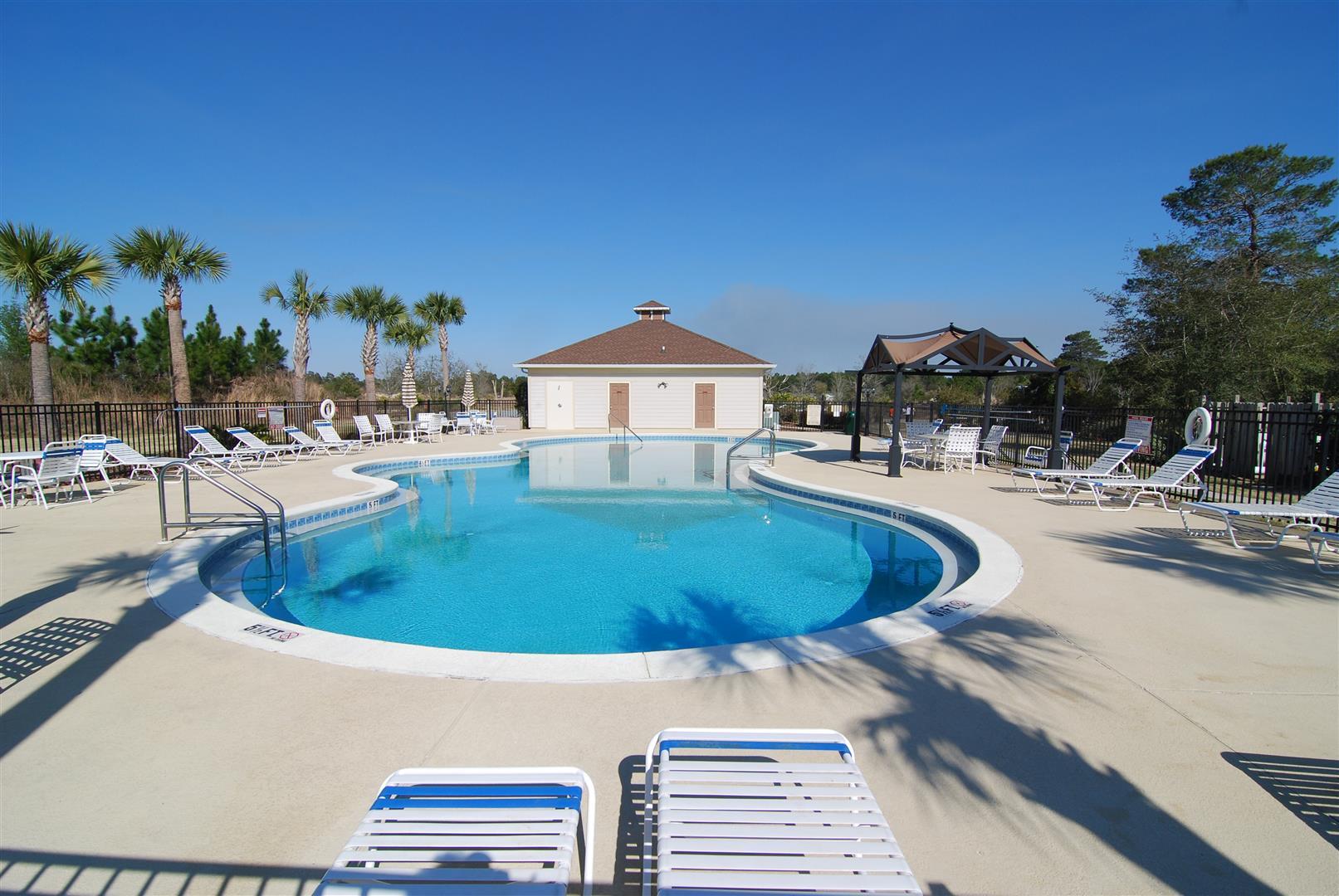 Lot 23 Gulf Pines Freeport, FL 32439 - Photo 5 of 9 a view of a swimming pool with outdoor seating