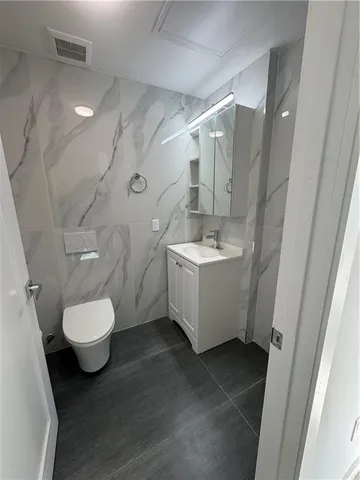 a view of cabinets and wooden floor