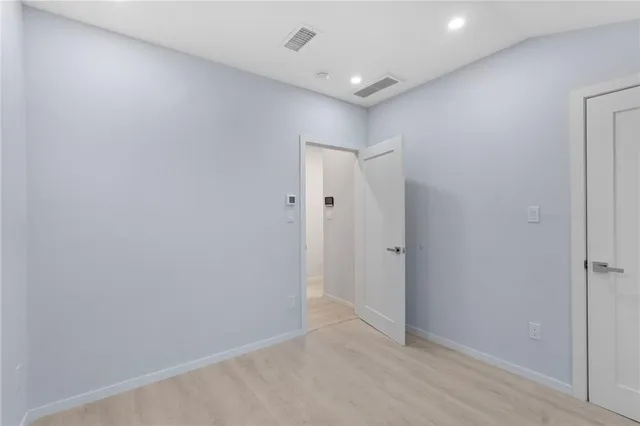 a view of a bedroom from hallway