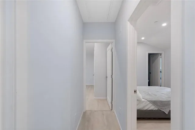 a bed room with a bed and a window