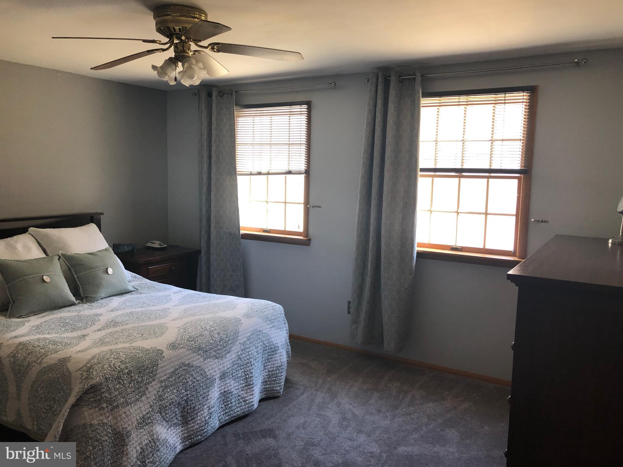 11605 Stevens Road Philadelphia, PA 19116 - Photo 20 of 44 a bedroom with a bed and a window