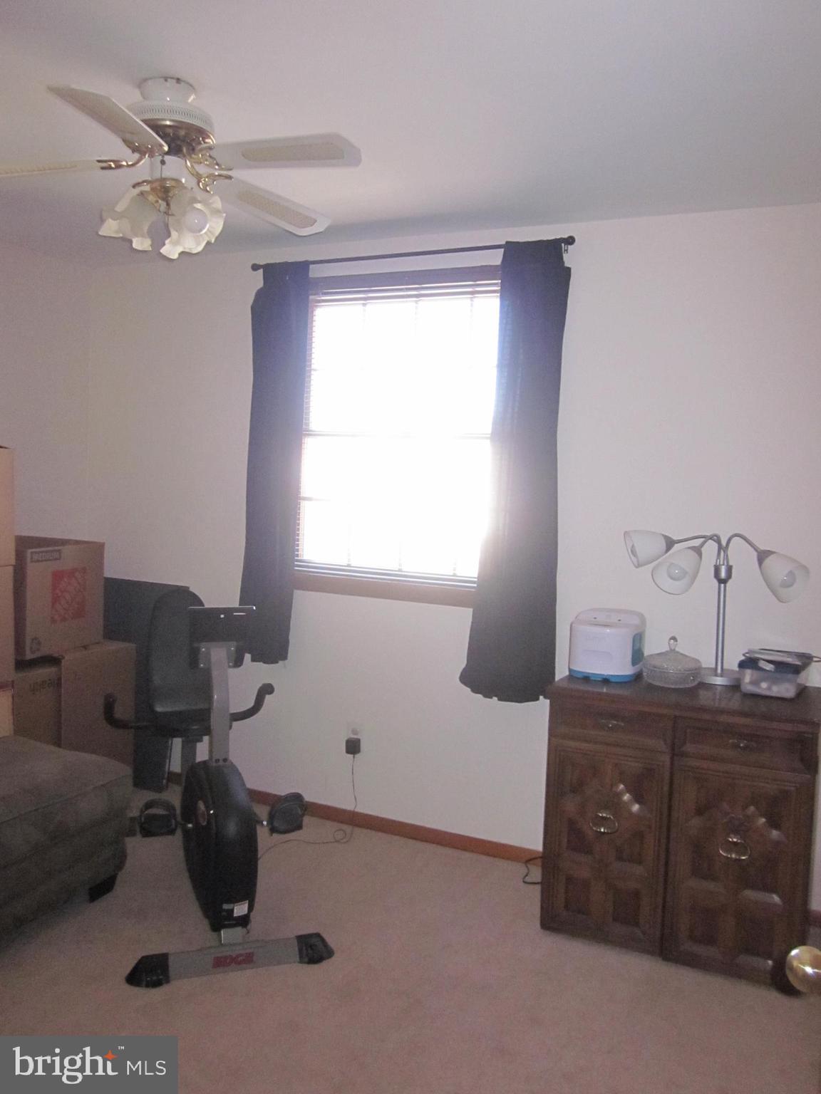11605 Stevens Road Philadelphia, PA 19116 - Photo 27 of 44 a bedroom with a bed and window
