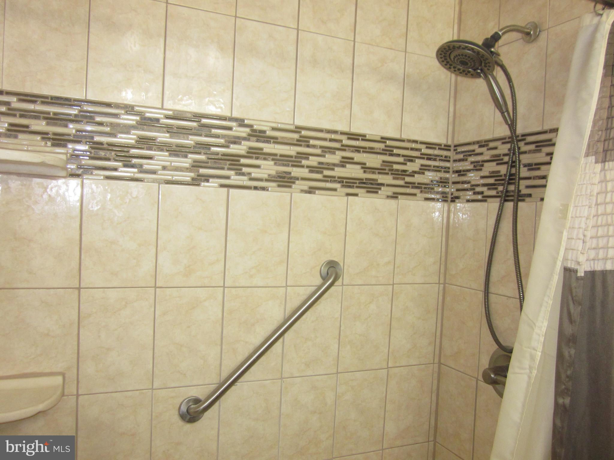 11605 Stevens Road Philadelphia, PA 19116 - Photo 29 of 44 a bathroom with a sink and a shower