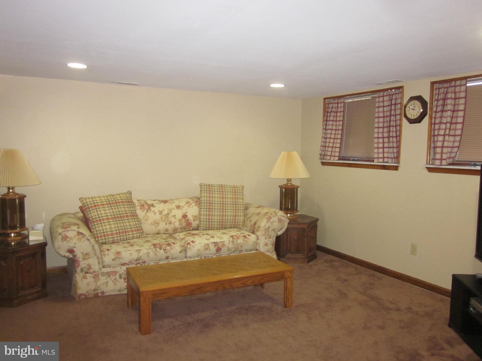 11605 Stevens Road Philadelphia, PA 19116 - Photo 31 of 44 a bedroom with furniture and a window