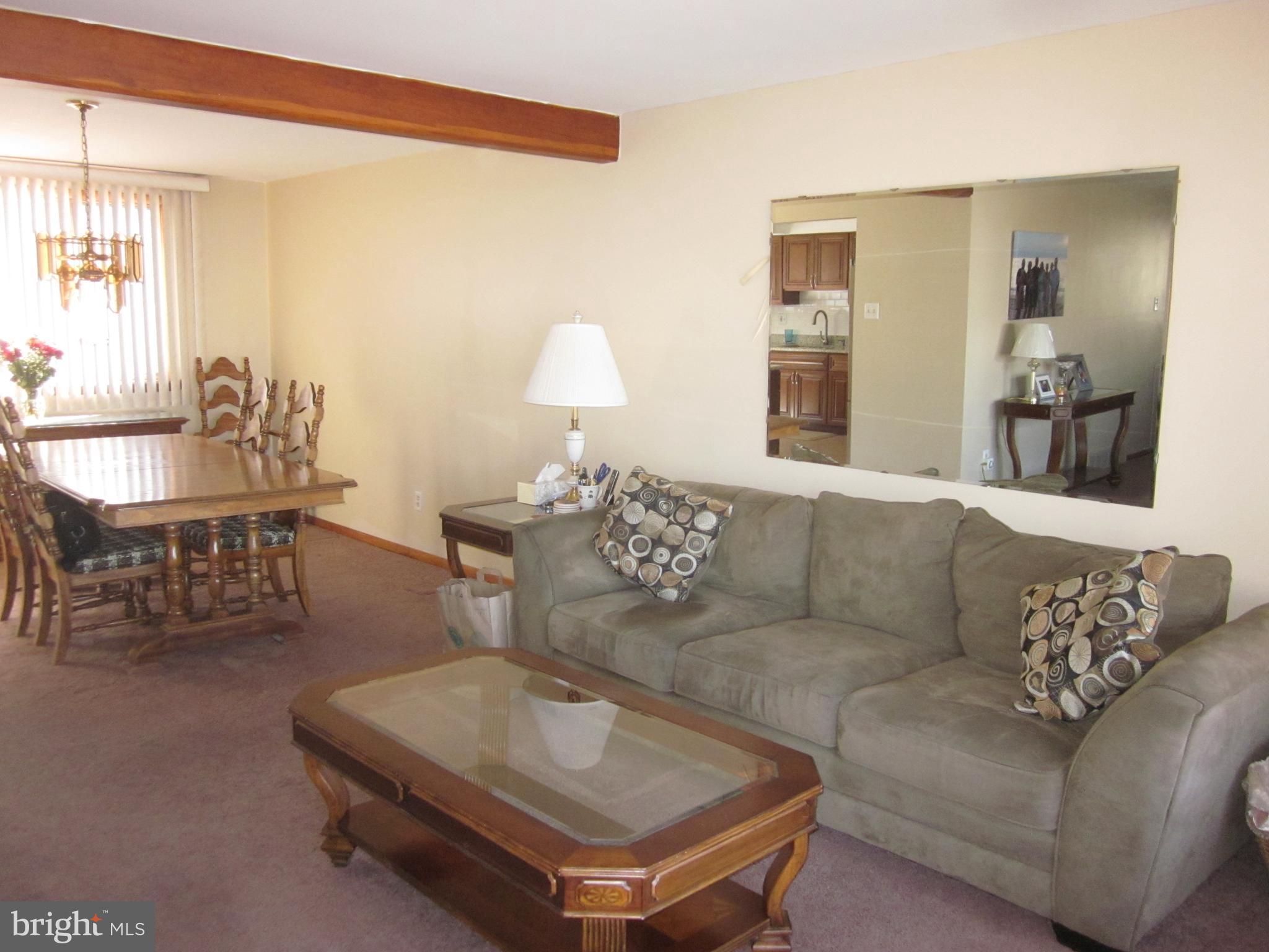 11605 Stevens Road Philadelphia, PA 19116 - Photo 8 of 44 a living room with furniture and a table
